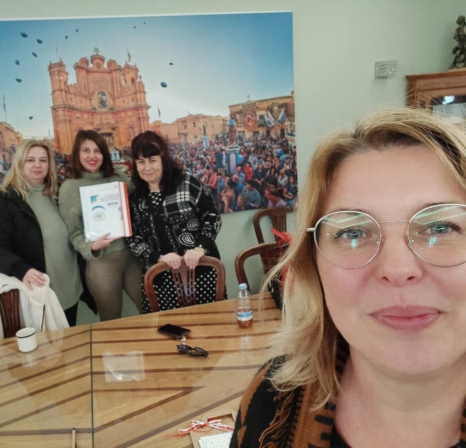Course participants with welcome packs at the Genista office in Gharb, Gozo